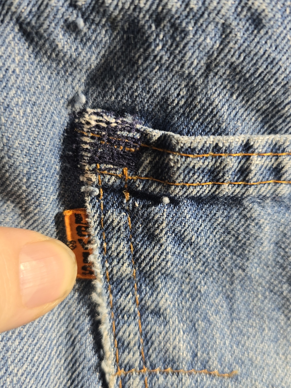 Levi's Light Blue Denim with Orange Tab and Stitching Detail